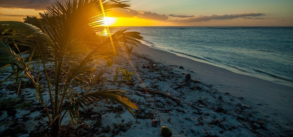 Sun sets on our next adventure, Christmas Island, home to the elusive red bass.
