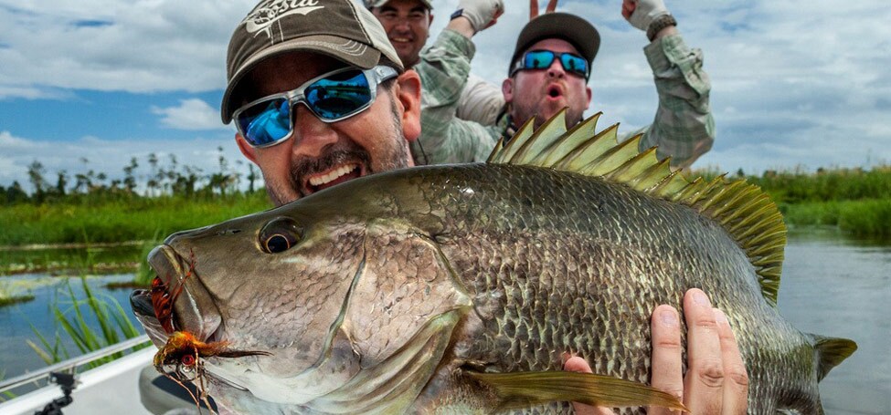 After 2 expeditions to PNG Thad pick his 1st Black bass out of the depths. Casting the biggest fly rods made can take a toll but believing that it could happen is what keeps you going.