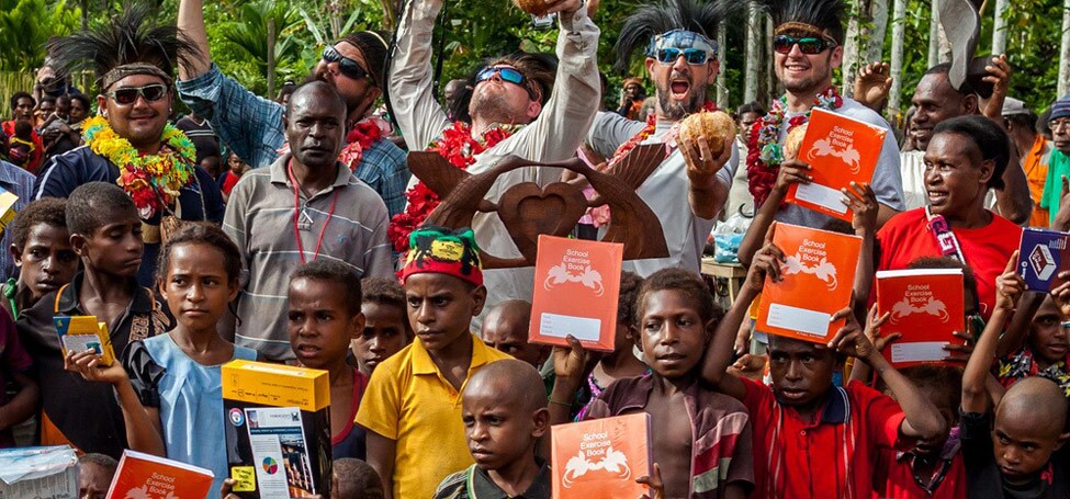 After making landfall at the local village we offered school supplies as donations and they welcomed us with a huge celebration wishing us good luck fishing in their waters.